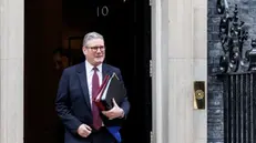 epa11890261 British Prime Minister Keir Starmer departs his official residence at 10 Downing Street to appear at Prime Minister's Questions (PMQs) at Parliament in London, Britain, 12 February 2025. EPA/TOLGA AKMEN