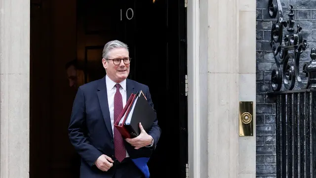 epa11890261 British Prime Minister Keir Starmer departs his official residence at 10 Downing Street to appear at Prime Minister's Questions (PMQs) at Parliament in London, Britain, 12 February 2025. EPA/TOLGA AKMEN