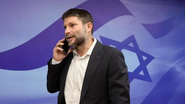 epa10504350 Israeli Minister of Finance and leader of the Religious Zionist Party, Bezalel Smotrich, arrives to attend the weekly cabinet meeting at the prime minister's office in Jerusalem, 05 March 2023. EPA/GIL COHEN-MAGEN / POOL