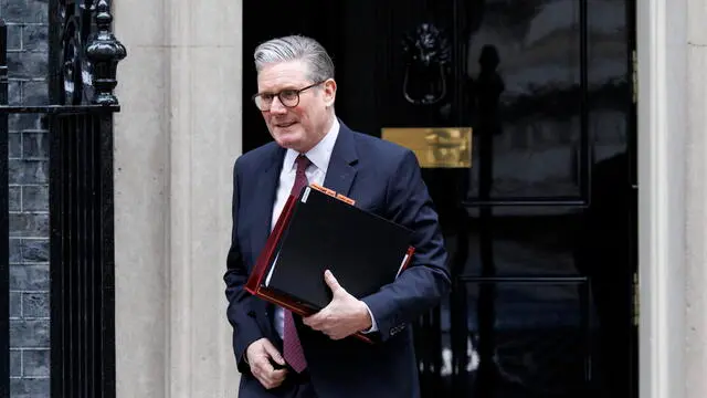 epa11890263 British Prime Minister Keir Starmer departs his official residence at 10 Downing Street to appear at Prime Minister's Questions (PMQs) at Parliament in London, Britain, 12 February 2025. EPA/TOLGA AKMEN