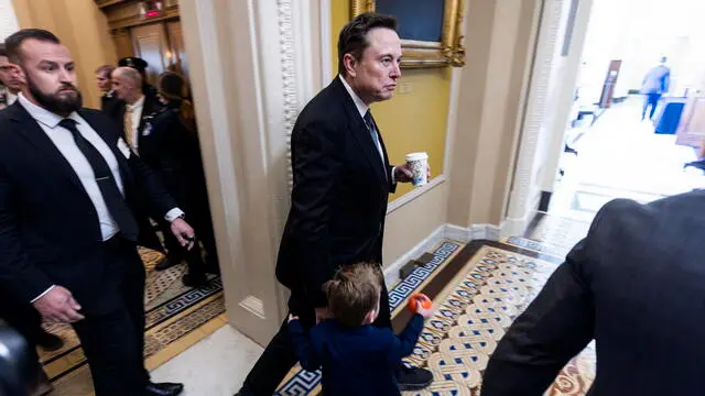 epa11758784 Businessman Elon Musk (C), President-elect Donald Trump's pick to lead the newly-created Department of Government Efficiency (DOGE), with his son X Æ A-Xii, leave a meeting with the next Senate Majority Leader John Thune in the US Capitol in Washington, DC, USA, 05 December 2024. DOGE co-leader, US businessman Vivek Ramaswamy, is also on the Hill meeting with Senators. EPA/JIM LO SCALZO