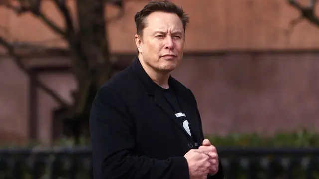 epa11893565 US entrepreneur and US special government employee Elon Musk leaves Blair House close to the White House, in Washington, DC, USA, 13 February 2025. EPA/WILL OLIVER