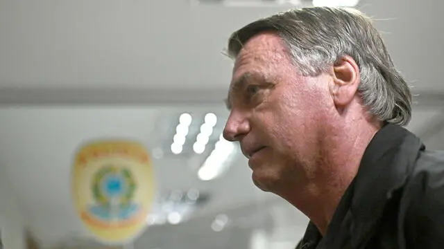 epa11906174 Brazil's former president Jair Bolsonaro arrives for a meeting with opposition parliamentarians at the Federal Senate, in Brasilia, Brazil, 18 February 2025. EPA/Andre Borges