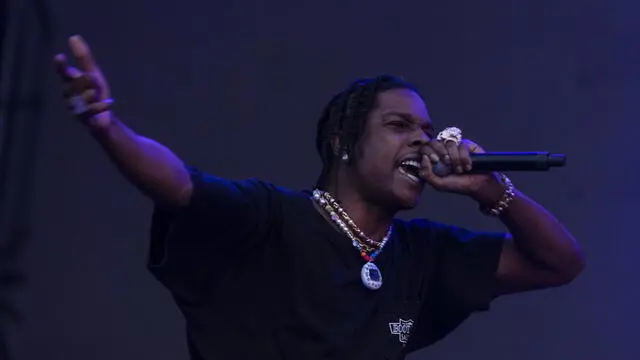 epa09837194 Rapper ASAP Rocky performs during the Lollapalooza 2022 festival at the Cerrillos Bicentennial Park in Santiago, Chile, 19 March 2022. Thousands of young people, fans of music and the festival atmosphere, gathered to enjoy one of the most important festivals in South America, which reopened its doors after two years as it was closed by Covid-19, and gives hope for one of the sectors hardest hit by the pandemic. EPA/Alberto Valdes