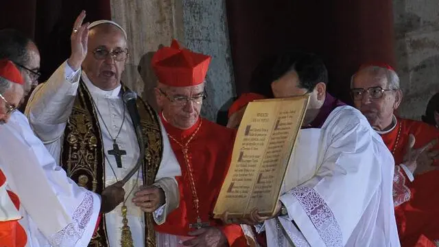 New Pope, Argentinian cardinal Jorge Mario Bergoglio appears at the window of St Peter's Basilica's balcony after being elected the 266th pope of the Roman Catholic Church on March 13, 2013 at the Vatican. ANSA/ETTORE FERRARI