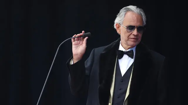 epa11387714 Italian tenor Andrea Bocelli performs during the official naming ceremony for the Cunard cruise ship the Queen Anne in Liverpool, Britain, 03 June 2024. The Queen Anne is Cunardâ€™s latest luxury pinnacle-class cruise ship and the second largest in the fleet at 332.5 metres and 113,000 gross tons. The ship will be officially named at an event in Liverpool, the former headquarters of the shipping line. EPA/ADAM VAUGHAN