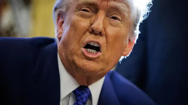 epa11896811 US President Donald Trump speaks to the media as he signs executive orders in the Oval Office at the White House in Washington, DC, USA, 14 February 2025. The executive orders signed on 14 February were on federal funding going to schools and universities related to the coronavirus pandemic as well as energy production. EPA/SAMUEL CORUM / POOL