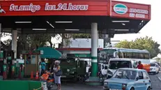 epa08211619 Several vehicles wait to refuel at a gas station in Havana, Cuba, 11 February 2020. Cuba is once again facing problems of fuel shortages that have caused long lines at gas stations throughout the country, whose inhabitants also suffer these days from getting toilet and other basic products such as detergent and sanitary paper. The supply of diesel and gasoline has had moments of instability since last September the authorities denounced that the new sanctions of the United States hindered the arrival of oil ships to the island, but the crisis has worsened since the end of last week. EPA/Yander Zamora