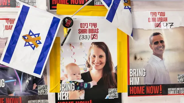 epa11906493 A poster of Israeli hostage Shiri Bibas at a protest camp of hostages' families near Prime Minister Netanyahu's residence in Jerusalem, 19 February 2025. Hamas announced that the bodies of Shiri Bibas and her toddler sons, Ariel and Kfir, along with another dead hostage, would return to Israel in coffins on 20 February. According to Israel's military, around 100 Israeli hostages remain in captivity in the Gaza Strip, including the bodies of at least 33 confirmed dead. EPA/ABIR SULTAN