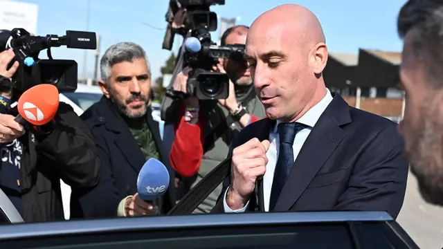 epa11895345 Former president of the Spanish Soccer Federation (RFEF) Luis Rubiales leaves after a session in the trial against Rubiales and three co-defendants at the Audiencia Nacional Court, in San Fernando de Henares, Madrid, Spain, 14 February 2025. Rubiales is accused of sexual assault for the non-consensual kiss to player Hermoso after the Spanish team's victory in the FIFA Women's World Cup in Sydney, Australia, in August 2023. Three of his former colleagues, Vilda, Luque, and Rivera are accused of colluding in the coercion of Rubiales. EPA/FERNANDO VILLAR