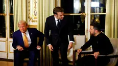 epa11762580 French President Emmanuel Macron (C), US President-elect Donald Trump (L) and Ukrainian President Volodymyr Zelensky attend a trilateral meeting at the Elysee Palace, as part of ceremonies mark the reopening of the Notre Dame de Paris cathedral, in Paris, France, 07 December 2024. The Notre Dame de Paris Cathedral reopens on 07 December after nearly six years of renovation work following its destruction by a fire on 15 April 2019. EPA/SARAH MEYSSONNIER / POOL MAXPPP OUT