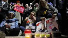 epa11910617 People gather to light candles at Hostages Square after the release of the bodies of four Israeli hostages held in Gaza, in Tel Aviv, Israel, 20 February 2025. Hamas was to hand over the bodies of four Israeli captives, including that of youngest hostage Kfir Bibas, as part of the ongoing Gaza ceasefire deal. Hamas said in November 2023 that the two Bibas boys and their mother had been killed in an Israeli airstrike on Gaza. EPA/ABIR SULTAN