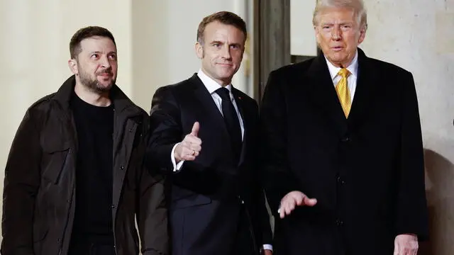 epa11762974 (L-R) Ukraine's President Volodymyr Zelensky, French President Emmanuel Macron, and US president-elect Donald J. Trump leave the Elysee Palace to attend the ceremony for the reopening of the Notre Dame de Paris Cathedral, in Paris, France, 07 December 2024. The Notre-Dame de Paris Cathedral reopens on 07 December after nearly six years of renovation work following its destruction by a fire on 15 April 2019. EPA/MOHAMMED BADRA