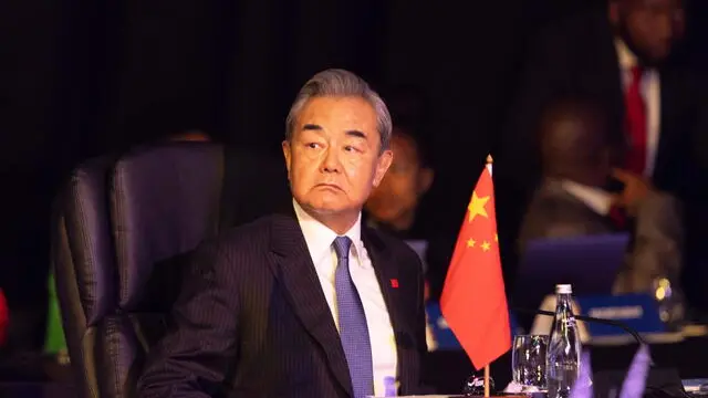 epa11910195 China Foreign Minister Wang Yi attends the G20 Foreign Ministers meeting at Nasrec Expo Centre, Johannesburg, South Africa, 20 February 2025. The meeting of the G20 Foreign Ministers leads up to the The G20 Summit in November 2025 in Johannesburg that will bring together leaders from 55 nations and organizations. EPA/KIM LUDBROOK