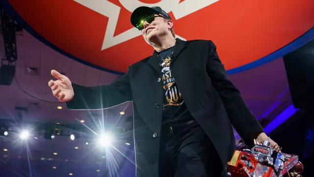 epa11911597 US entrepreneur and US special government employee Elon Musk with a chainsaw given to him by Argentine President Javier Milei at the Conservative Political Action Conference (CPAC) 2025 at National Harbor, Maryland, USA, 20 February 2025. The Conservative Political Action Conference is an annual political conference attended by conservative activists and elected officials from across the United States and beyond. EPA/WILL OLIVER / POOL