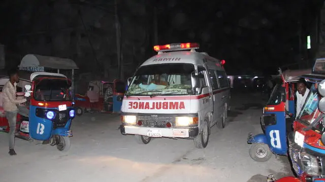 epa10682365 Emergency services on the scene as Somalia's security forces conduct an operation to neutralise fighters belonging to al Shabaab who attacked a hotel in the capital Mogadishu, Somalia, 09 June 2023, the state news agency said, while the group claimed responsibility for the attack. Attackers stormed a restaurant in the Somali capital Mogadishu using explosives and guns, wounding at least seven people, a witness and the capital's ambulance services said. EPA/Said Yusuf Wasame