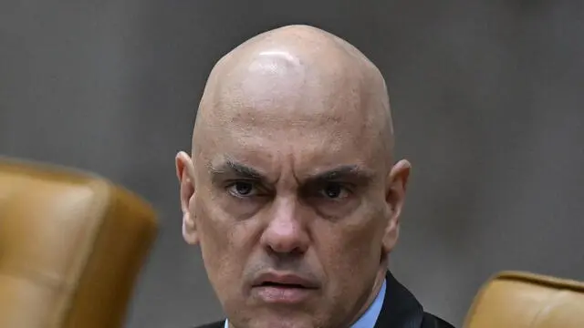 epa11651485 Supreme Federal Court (STF) Justice Alexandre de Moraes participates in an ordinary session of the STF plenary in Brasilia, Brazil, 09 October 2024. The Brazilian high court authorized the social media network X (formerly Twitter) to resume operations in Brazil after a months-long legal dispute, in a ruling issued by Justice Moraes on 08 October 2024. EPA/ANDRE BORGES