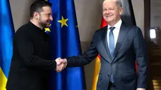 epa11897811 German Chancellor Olaf Scholz (R) and Ukrainian President Volodymyr Zelensky (L) shake hands as they meet for talks at the Munich Security Conference (MSC), in Munich, Germany, 15 February 2025. High-level international decision-makers meet at the 61st Munich Security Conference in Munich from 14 to 16 February 2025 during their annual meeting to discuss global security issues. EPA/SVEN HOPPE / POOL