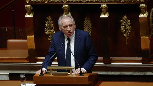 epa11907942 French Prime Minister Francois Bayrou speaks during a session on a no-confidence vote against the government at the National Assembly in Paris, France, 19 February 2025. The no-confidence vote, filed by the Socialist Party (PS), comes in response to the statement made by French Prime Minister Francois Bayrou on January 27 about a feeling of being 'overwhelmed' by migration. EPA/YOAN VALAT