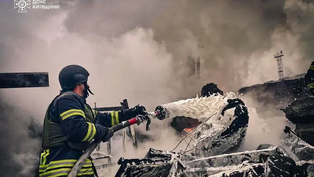 epa11717808 A handout photo made available by the State Emergency Service of Ukraine shows Ukrainian rescuers working at the site of a Russian attack on a building in the city of Brovary near Kyiv, Ukraine, 13 November 2024, amid the ongoing Russian invasion. At least one person was injured following a Russian overnight combined attack in Kyiv's area, according to the State Emergency Service of Ukraine (SESU). According to the Ukrainian Armed Forces, Russian troops launched an overnight attack with six rockets of different types and 90 'Shahed' unmanned aerial vehicles (UAVs) across Ukraine. EPA/SECURITY SERVICE OF UKRAINE HANDOUT HANDOUT EDITORIAL USE ONLY/NO SALES