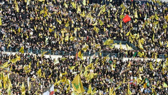 epaselect epa11918070 Thousands of people attend the funeral of Hezbollah's former leader Hassan Nasrallah and senior leader Hashem Safieddine at the Camille Chamoun sports stadium in the outskirts of Beirut, Lebanon, 23 February 2025. Nasrallah and Safieddine were killed in two separate Israeli airstrikes on Beirut in late 2024. EPA/WAEL HAMZEH