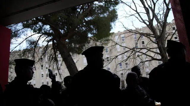 epa11229262 Police officers secure the area during the French president's visit focused on security and the fight against drug trafficking, in La Castellane, district of Marseille, southern France, 19 March 2024. EPA/CHRISTOPHE ENA / POOL MAXPPP OUT