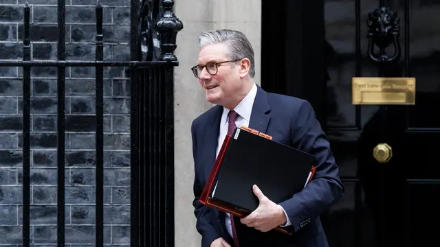 epa11890262 British Prime Minister Keir Starmer departs his official residence at 10 Downing Street to appear at Prime Minister's Questions (PMQs) at Parliament in London, Britain, 12 February 2025. EPA/TOLGA AKMEN