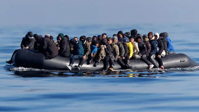 epa11202046 Around 60 migrants cross the English Channel on a small boat, on 06 March 2024. The UK government has suffered more setbacks at the House of Lords recently on its plan to send migrants to Rwanda to deter the Channel crossings. Despite the British and French government's efforts to prevent migrants from making the dangerous journey on small boats, many are willing to take the risk to claim asylum in the UK. EPA/TOLGA AKMEN