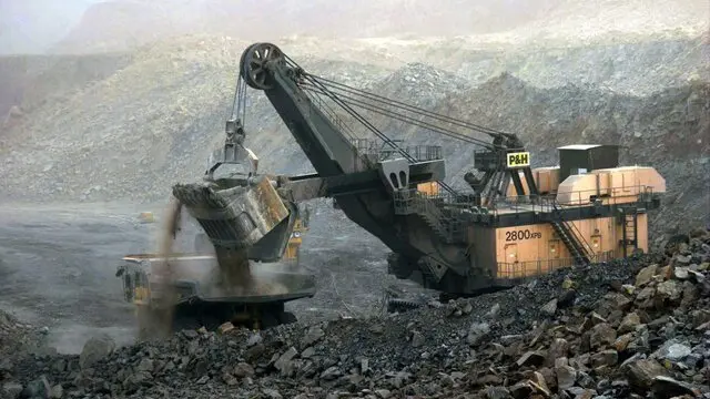 epa03086902 (FILE) A file photo dated 07 July 2005 showing an earth digger dumping dirt on to a large truck at the Antaibao open-air coal mine near Shuozhou, Shanxi Province, China. Geneva-based World Trade Organization (WTO) dismissed a Chinese appeal on 30 January 2012 and upheld its decision that Beijing’s practice of limiting certain raw materials including magnesium should end. Western countries that won the trade dispute over Chinese export restrictions on industrial raw materials, have already set their sights on a new goal: prying open Beijing's restrictive policies on rare earths. However, China is unlikely to budge on these minerals, now sought after by high-tech industries, unless there is a specific new ruling by the World Trade Organization (WTO), expert Jaakko Kooroshy said 31 January 2012. EPA/QILAI SHEN