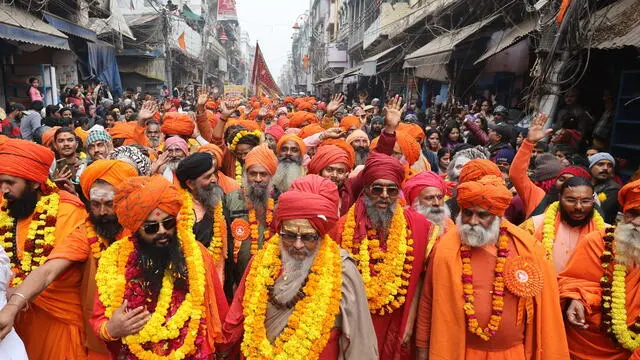 epa11819957 Members of Panchayati Akhara Bada Udasin take part in a religious procession as they head towards the Kumbh Mela festival ahead of the royal bath near the Sangam, the confluence of three of the holiest rivers in Hindu mythology - Ganga, Yamuna, and the mythical Saraswati - in Prayagraj, Uttar Pradesh, India, 12 January 2025. Every 12 years, Hindu pilgrims gather for ritual baths at the river's banks during the Maha Kumbh Mela festival. EPA/RAJAT GUPTA