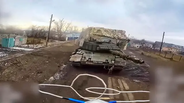 epa11828958 A still image taken from a handout video made available by the Russian Defence Ministry Press-Service on 16 January 2025 shows a Russian FPV drone with an explosive attacks Germany made battle tank 'Leopard' at an undisclosed location in Kursk region, Russia. Fighting between Russian and Ukrainian forces has been ongoing in the Kursk region since 06 August 2024 following a Ukrainian military incursion into the Russian border region. EPA/RUSSIAN DEFENCE MINISTRY HANDOUT HANDOUT EDITORIAL USE ONLY/NO SALESHANDOUT EDITORIAL USE ONLY/NO SALES