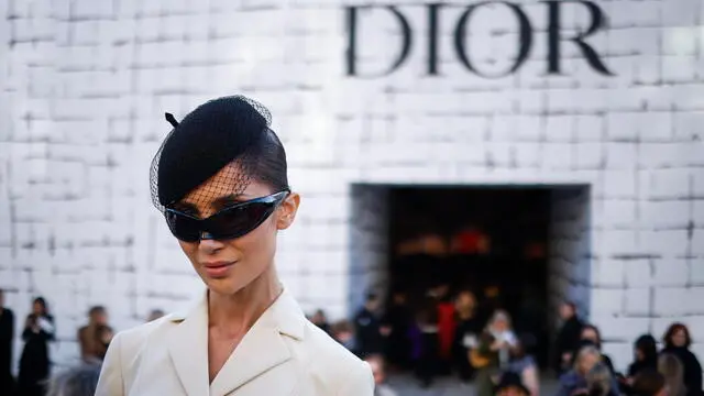 epa11096623 A guest leaves after the presentation of the Spring/Summer 2024 Haute Couture collection by Dior during the Paris Fashion Week, in Paris, France, 22 January 2024. The presentation of the Haute Couture collections runs from 22 to 25 January. EPA/YOAN VALAT