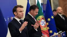 epa11930095 French President Emmanuel Macron (L) and Portuguese Prime Minister Luis Montenegro (R) attend a press conference after signing bilateral agreements at the city hall in Porto, Portugal, 28 February 2025. EPA/JOSE COELHO