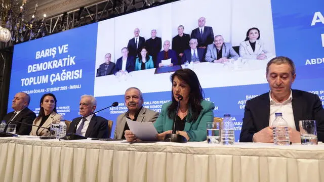 epa11928157 Delegation members of the Turkish pro-Kurdish Peoples' Equality and Democracy Party (DEM) Cengiz Cicek (L), Tulay Hamitogullari (2-L), Ahmet Turk (3-L), Sirri Sureyya Onder (3-R), Pervin Buldan (2-R), and Tuncer Bakirhan (R) address a press conference held after a visit with jailed Kurdistan Workers' Party (PKK) leader Abdullah Ocalan (seen on screen picture, C), in Istanbul, Turkey, 27 February 2025. During the press conference, a letter from the imprisoned PKK militant leader was read, in which Abdullah Ocalan called on the Kurdish group to lay down their arms. EPA/ERDEM SAHIN