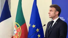 epa11930086 French President Emmanuel Macron attends a press conference after signing bilateral agreements with Portuguese Prime Minister Luis Montenegro (not seen) at the city hall in Porto, Portugal, 28 February 2025. EPA/JOSE COELHO