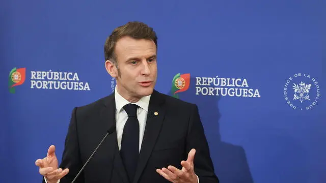 epa11930084 French President Emmanuel Macron speaks at a press conference after signing bilateral agreements with Portuguese Prime Minister Luis Montenegro (not seen) at the city hall in Porto, Portugal, 28 February 2025. EPA/PAULO NOVAIS