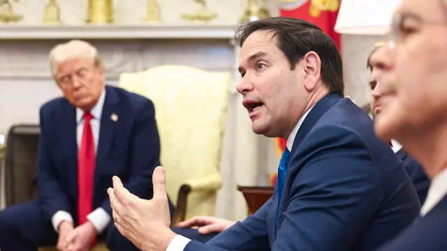 epa11930697 US Secretary of State Marco Rubio speaks while attending a meeting between US President Donald Trump (L) and Ukrainian President Volodymyr Zelensky in the Oval Office of the White House in Washington, DC, USA, 28 February 2025. Zelensky is in Washington to sign the framework of a deal, pushed by President Trump, to share Ukraines’s mineral wealth with the US. EPA/JIM LO SCALZO / POOL