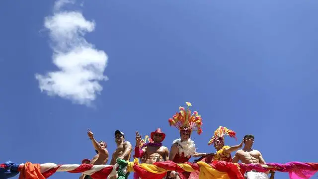 epa04104942 Participants take part during the annual gay pride march in Cape Town, South Africa, 01 March 2014. South African gays and lesbians marched in solidarity with the people of Uganda. Uganda impossed vehemently anti-gay legislation in February 2014 with President Yoweri Museveni making anti-homosexuality laws and signing a bill that makes some homosexual acts punishable by life in prison. South Africa's highest court ruled in December 2005 that it is unconstitutional to prevent gay people from marrying, making South Africa the first to legalize same-sex unions on a continent where homosexuality remains largely taboo. EPA/NIC BOTHMA