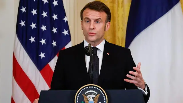 epa11922394 French President Emmanuel Macron holds a joint press conference with US President Donald Trump (not pictured) in the East Room of the White House in Washington, DC, USA, 24 February 2025. EPA/LUDOVIC MARIN / POOL