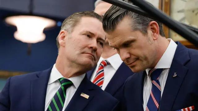 epa11922263 (L-R) US National Security Advisor Mike Waltz speaks with Defense Secretary Pete Hegseth as US President Donald Trump meets with French President Emmanuel Macron in the Oval Office of the White House in Washington, DC, USA, 24 February 2025. EPA/LUDOVIC MARIN / POOL