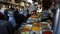 epa11928044 Syrian people shop at the Bab Serija market in preparation for the holy month of Ramadan in the capital, Damascus, Syria, 27 February 2025. EPA/MOHAMMED AL RIFAI