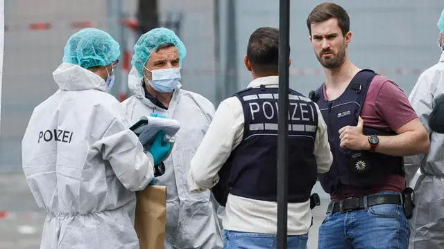 epa11381801 View of the crime scene after a knife attack in the city centre in Mannheim, Germany, 31 May 2024. According to the police, a man attacked a well-known critic of Islam in the centre of Mannheim. The attacker was stopped with a shot and a police officer's life is in danger. EPA/RONALD WITTEK
