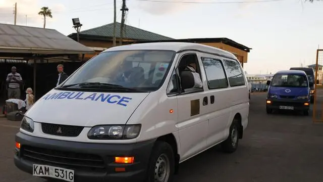 epa03367484 The ambulance carrying injured tourists departs from the Wilson airport for the hospital in Nairobi, Kenya, 22 August 2012. Local media reported that a propeller plane carrying 12 people, mostly western tourists, crashed in the Maasai Mara Game Reserve, one of the most popular tourist destinations in the country. At least four people, two Germans and two pilots, were killed in a crash, a report said. EPA/DAI KUROKAWA