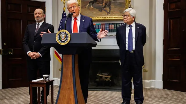 epa11938639 US President Donald Trump announces a $100 billion US investment by Taiwan Semiconductor Manufacturing Company (TSMC) alongside TSMC CEO C. C. Wei (R) and Commerce Secretary Howard Lutnick (L) in the Roosevelt Room of the White House, in Washington, DC, USA, on 03 March 2025 TSMC is the leading manufacturer of high end semiconductor chips in the world. EPA/Samuel Corum / POOL