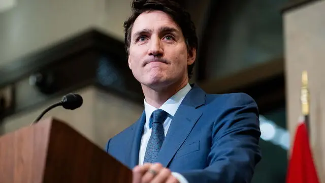 epa11940145 Canadian Prime Minister Justin Trudeau reacts during a press conference about new tariffs being imposed by the United States on Canadian goods in Ottawa, Canada, 04 March 2025. EPA/SPENCER COLBY