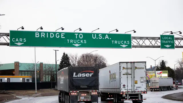 WINDSOR, CANADA - MARCH 4: Trucks head to the Ambassador Bridge between Windsor, Canada and Detroit, Michigan on the first day of President Donald Trump's new 25% tariffs on goods from Canada and Mexico on March 4, 2025 in Windsor, Canada. President Trump is also adding another 10% tariff on imports from China, bringing the tariffs on that country's goods to 20%. Bill Pugliano/Getty Images/AFP (Photo by BILL PUGLIANO / GETTY IMAGES NORTH AMERICA / Getty Images via AFP)