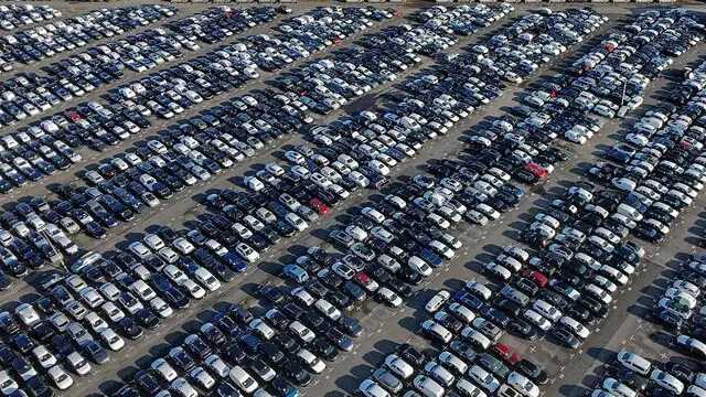 epa11872966 An aerial drone view of numerous new cars parked at a car logistics terminal in Essen, Germany, 03 February 2025. According to GTPA (Global Trade Analysis Project) analysis, potential US tariffs of 25 percent on EU car imports could decrease German car exports by 7.1 percent. EPA/FRIEDEMANN VOGEL