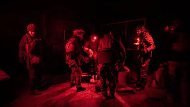 epa11902460 Soldiers from the Joint Assault Brigade 'Lyut', part of the Ukrainian National Police, at their position on the Toretsk front line, Donetsk region, Ukraine, 16 February 2025 (issued 17 February 2025). The brigade, formed by merging several police units that had been working in Donbas since 2014, uses Vampire drones to carry out attacks, as well as drop supplies on Ukrainian positions. The Vampire - nicknamed Baba Yaga by Russian troops - is a Ukrainian-made drone capable of remotely carrying out attacks with up to 15 kilograms of explosive. EPA/MARIA SENOVILLA