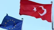 epa06191789 Turkish national flag flying close to the European Union flag in Istanbul, Turkey, 08 September 2017. After the German elections television debate between Merkel and Social Democrat challenger Martin Schulz on 03 September, Turkish President Recep Tayyip Erdogan accused them of 'bowing down to populism and prejudice' after both said they would seek an end to membership talks between the EU and Turkey. EPA/ERDEM SAHIN