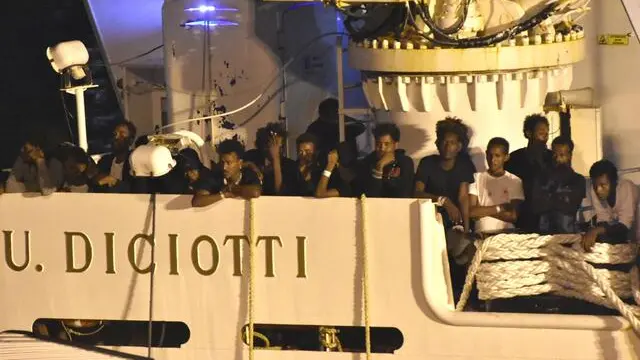 Migrants waiting to be disembarked from the Italian Coast Guard ship "Diciotti" in the port of Catania, Italy, 25 August 2018. ANSA/ORIETTA SCARDINO